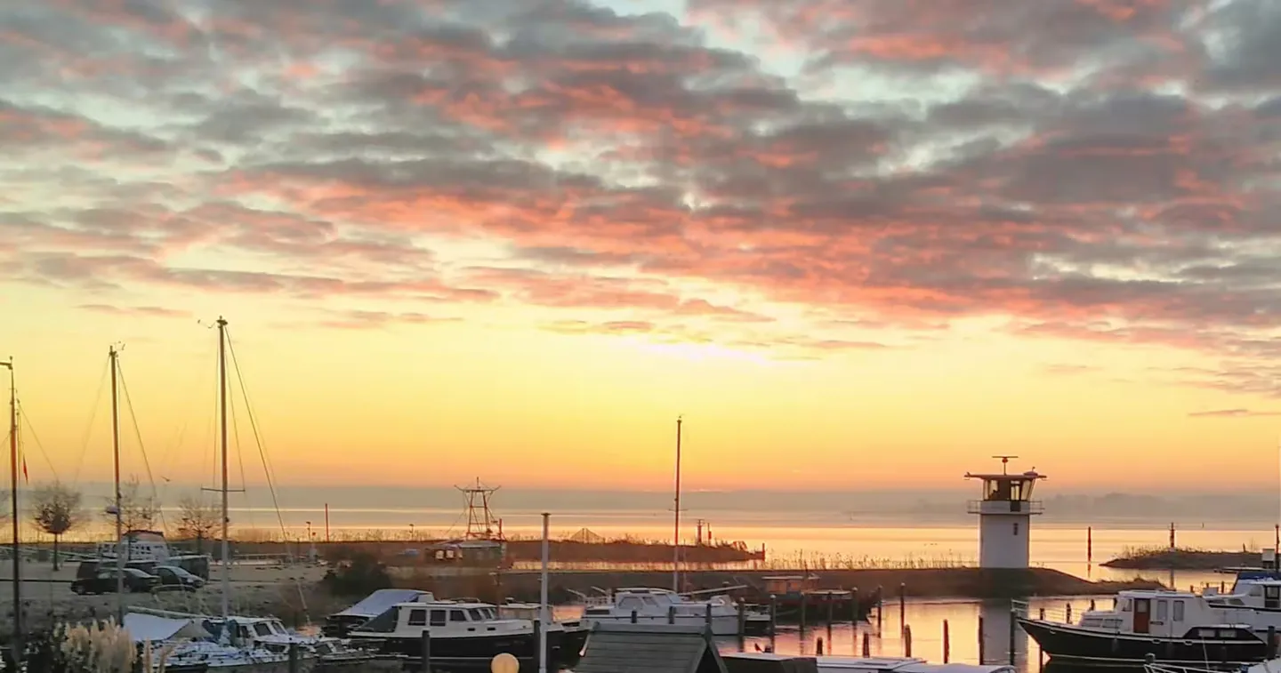 Almere · Exterior twilight — before HostRev