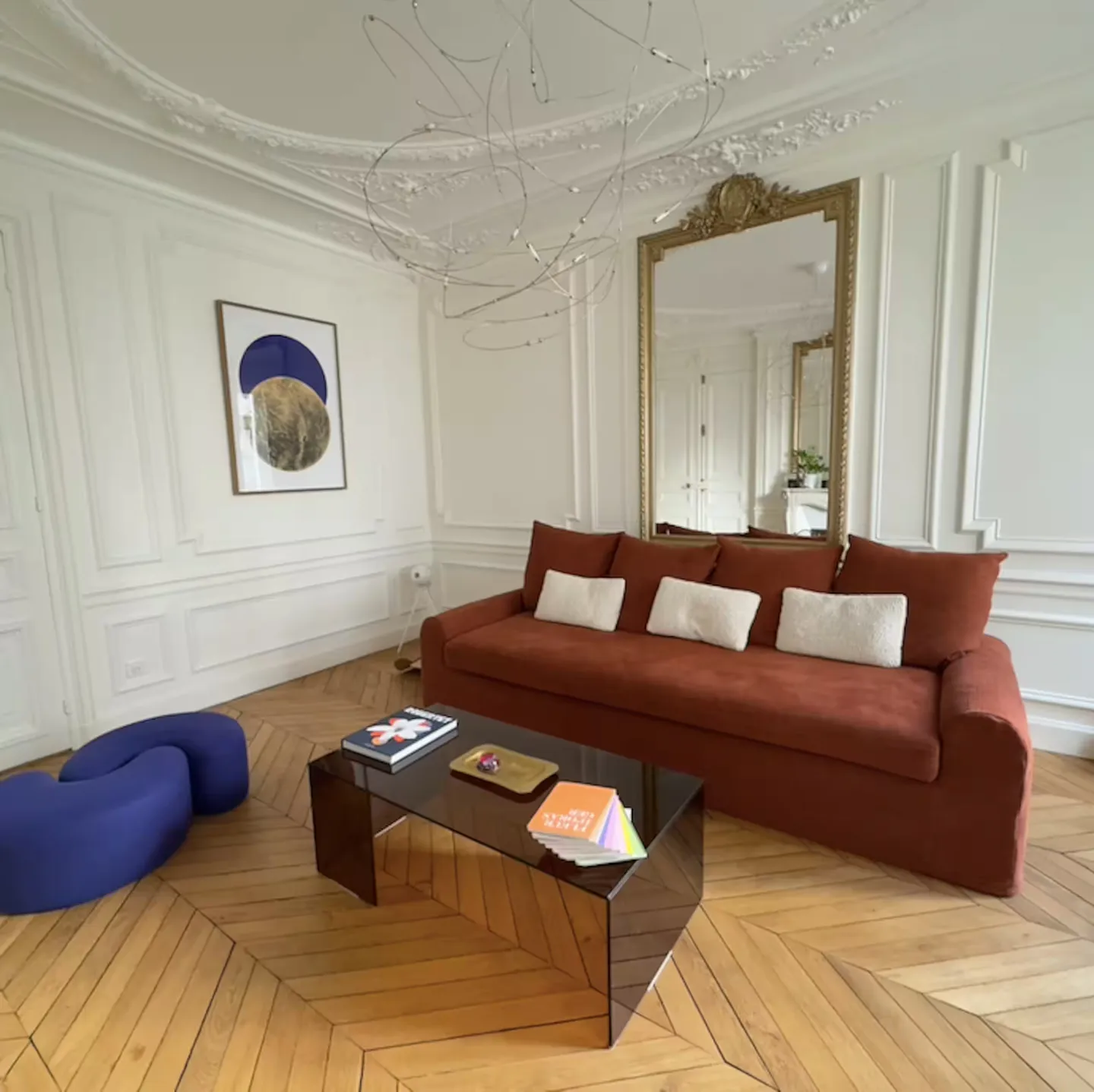 Paris · Woonkamer — before HostRev
